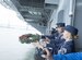 U.S. Air Force Col. Jimmy Canlas, 437th Airlift Wing (AW) commander and Chief Master Sgt. Jennifer Kersey, 437th AW command chief, toss a biodegradable wreath from the USS Yorktown into the Charleston Harbor in honor of the service members who died in the Pearl Harbor attacks, Dec. 7,1941 during the 76th Pearl Harbor Memorial Day Ceremony at Patriots Point Dec. 7, 2017.