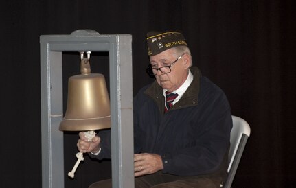 Ron Herzog, Veterans of Foreign Wars Post 10624 tolls a bell for each South Carolina resident killed during the attack on Pearl Harbor as their names are called out during the 76th Pearl Harbor Memorial Day Ceremony Dec. 7, 2017 on board the USS Yorktown at Patriots Point.