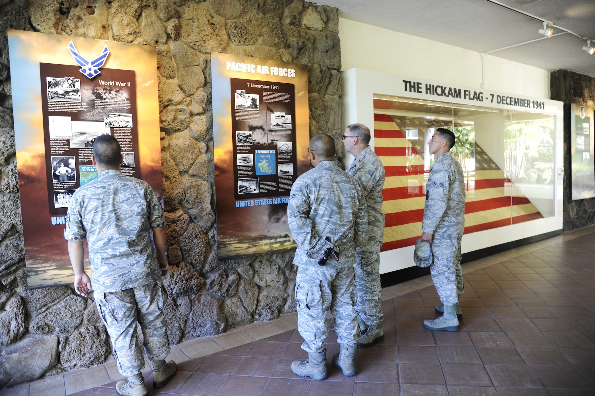 Reserve Citizen Airmen from the 624th Regional Support Group learn more about the Hickam Field attack during a battlefield staff ride at the Pacific Air Force Headquarters, Joint Base Pearl Harbor-Hickam, Hawaii, Dec. 3, 2017. The tour hosted by the unit’s historian, Staff Sgt. Christine Kearney-Kurt, focused on the remnants of war from 76 years ago during the Dec. 7, 1941, attack at Hickam Field when America was launched into World War II. (U.S. Air Force photo by Master Sgt. Theanne Herrmann)