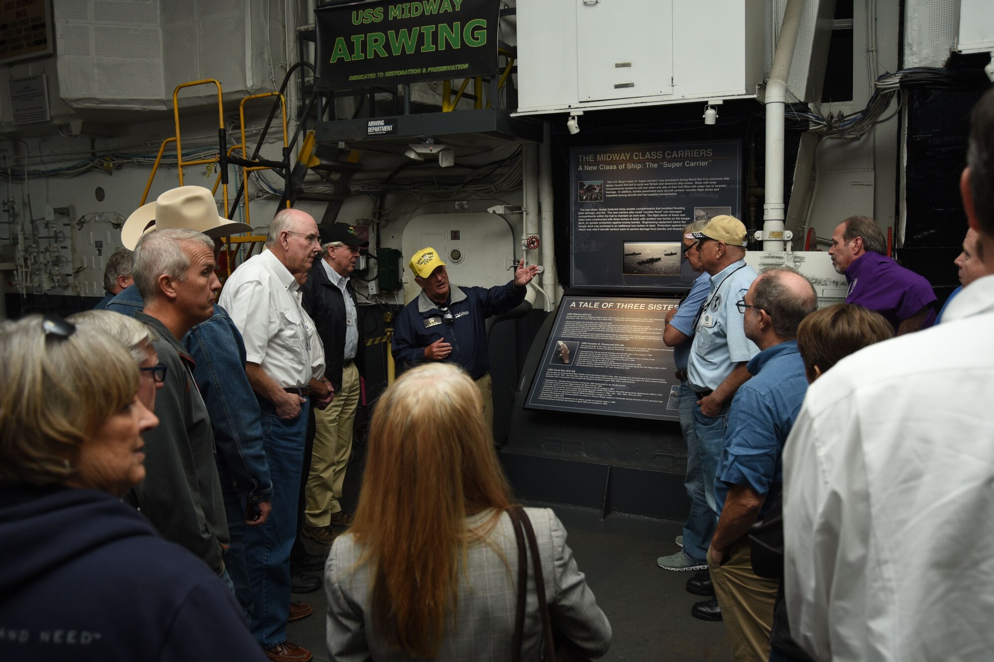 Walking around the USS Midway gives a historical perspective on what naval ships were like in times of conflicts on the sea. Dallas/Fort Worth civic leaders toured various naval assests throughout San Diego November16, 2017, to gain a greater understanding of U.S. military strength. Taking time to visit the USS Fort Worth, USS Midway and the Fleet Readiness Center's F-18 were some tour highlights. (U.S. Air Force photo by Maj. Candice Allen