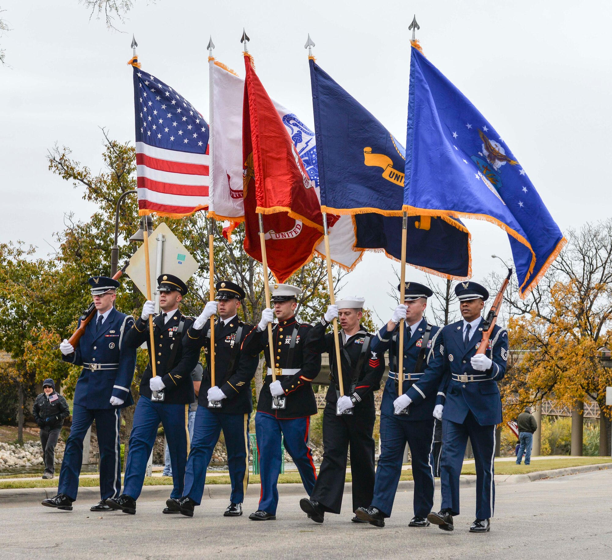 The Goodfellow Joint Service Color Guard marches during the Heroes Hunt parade in San Angelo, Texas, Dec. 7, 2017. The color guard led the parade along the Concho river walk.