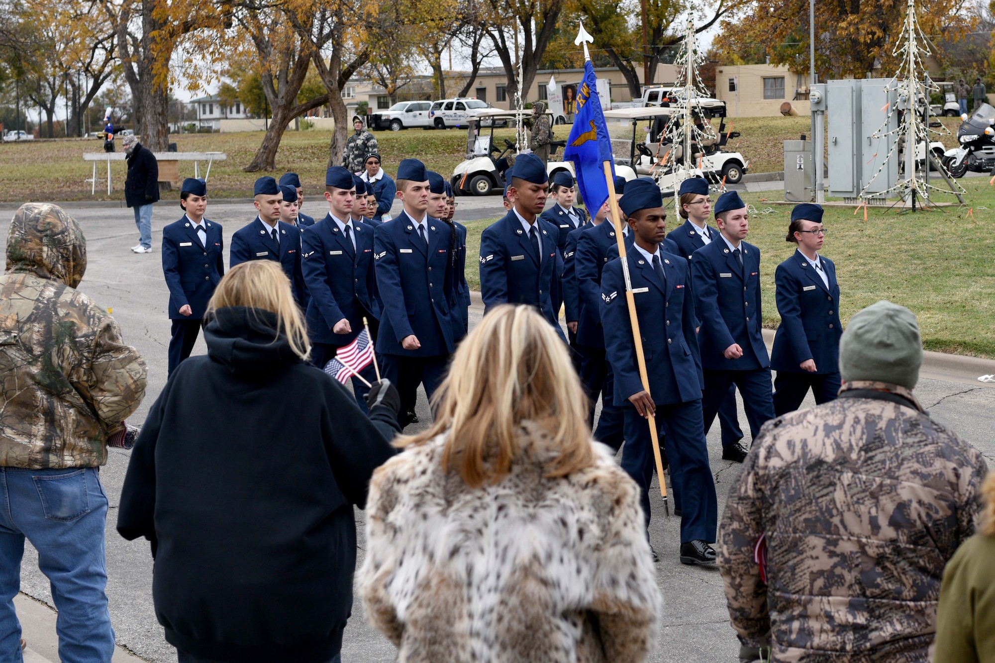 Airmen from the 17th Training Group march during the Heroes Hunt parade in San Angelo, Texas, Dec. 7, 2017. The mission of the 17th Training Group is to "Train, Develop and Inspire Professional Fire Protection and Intelligence, Surveillance and Reconnaissance Warriors."