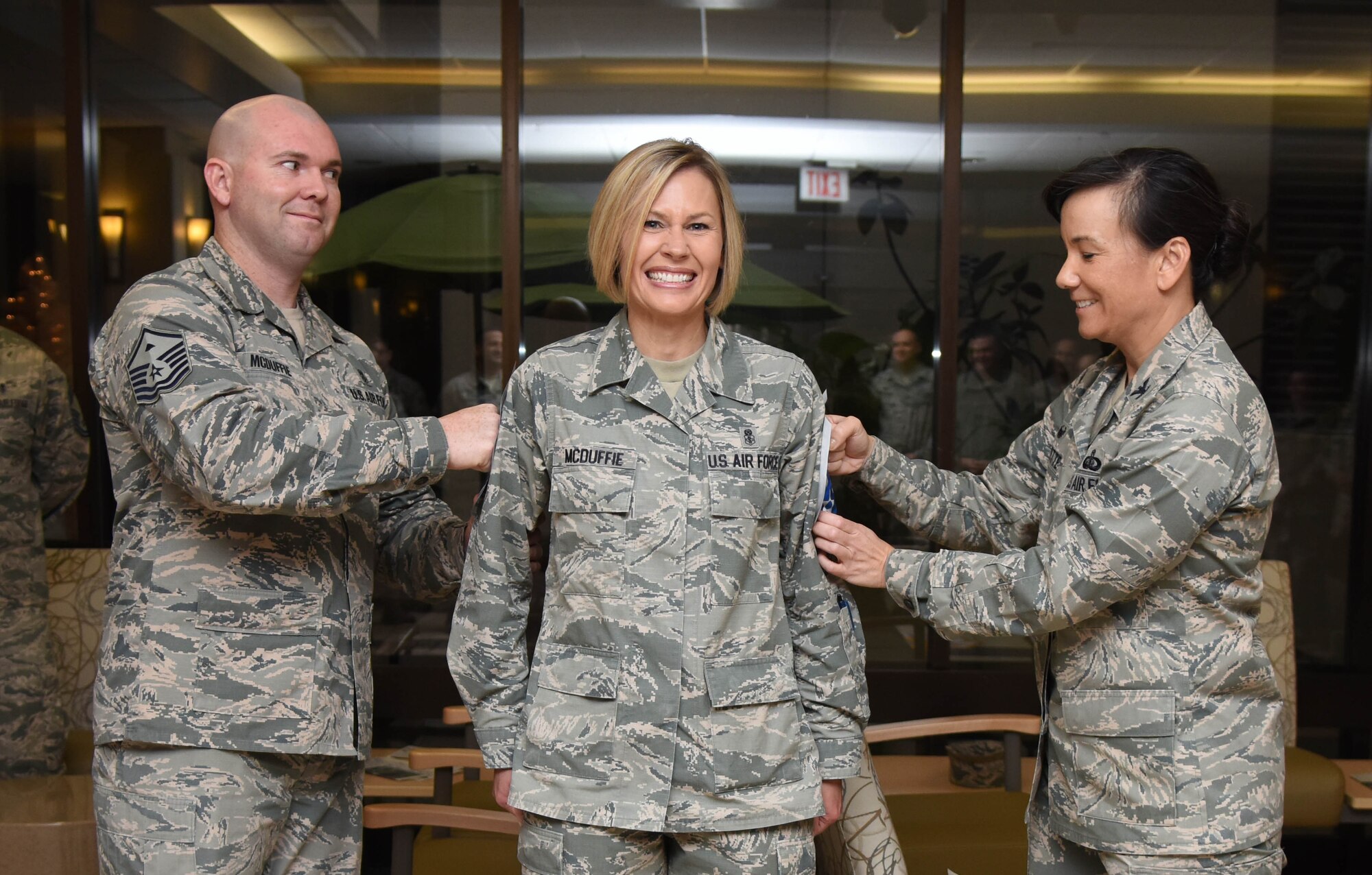 Master Sgt. William McDuffie, 81st Force Support Squadron first sergeant, and Col. Debra Lovette, 81st Training Wing commander, present Senior Master Sgt. Jacey McDuffie, 81st Diagnostic and Therapeutics Squadron pharmacy flight lead, with chief master sergeant stripes at the Keesler Medical Center Dec. 7, 2017, on Keesler Air Force Base, Mississippi. Keesler senior NCOs were recognized for their selection to join the top one percent of the Air Force’s enlisted force. (U.S. Air Force photo by Kemberly Groue)
