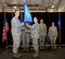Lt. Col. Christine L. Banks receives the 157th Maintenance Group guidon from Lt. Col. Brian R. Jusseaume, the 157th MXG commander, during a change of command ceremony on December 2, 2017, at Pease Air National Guard Base, N.H. Banks assumed command of the 157th Aircraft Maintenance Squadron. (N.H. Air National Guard photo by Staff Sgt. Kayla Rorick)