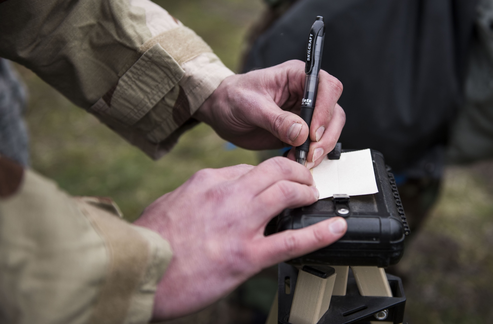 Airman 1st Class Michael Sweeney, 92nd Aircraft Maintenance Squadron crew chief, prepares a par stand during an exercise, at Fairchild Air Force Base, Washington Nov. 30, 2017. Mobility Airmen are trained in the detection of chemical and biological agents, a top priority in the wake of an enemy attack. (U.S. Air Force photo/ Senior Airman Sean Campbell)