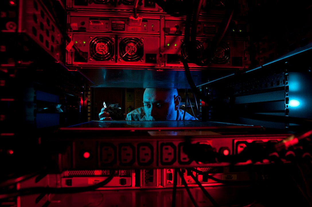 An airman prepares for a command cyber readiness
inspection.