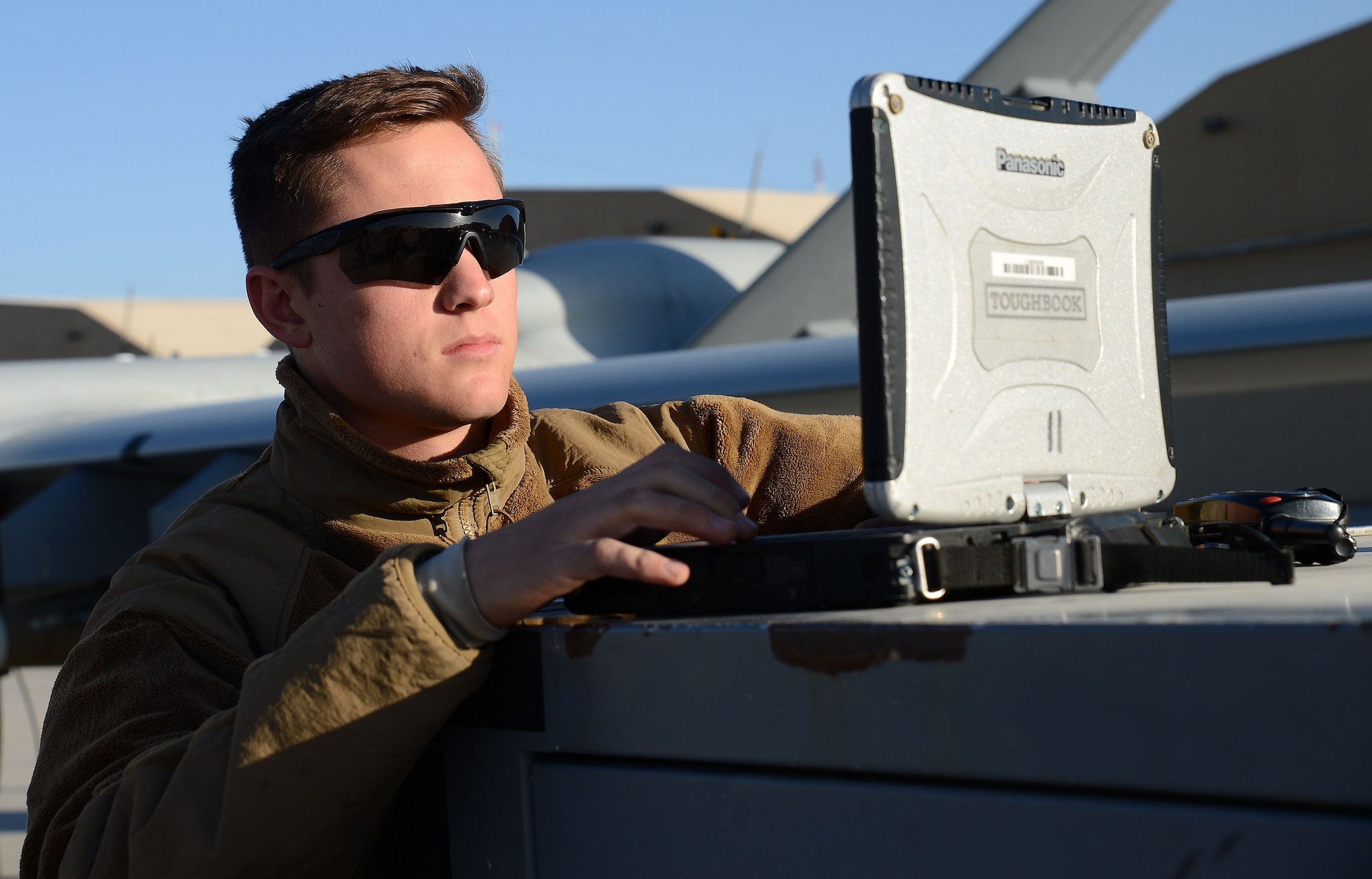 Airman 1st Class Gavin Claus, 62nd Expeditionary Attack Squadron crew chief, prepares an MQ-9 Reaper for takeoff Nov. 27, 2017 at Kandahar Airfield, Afghanistan.