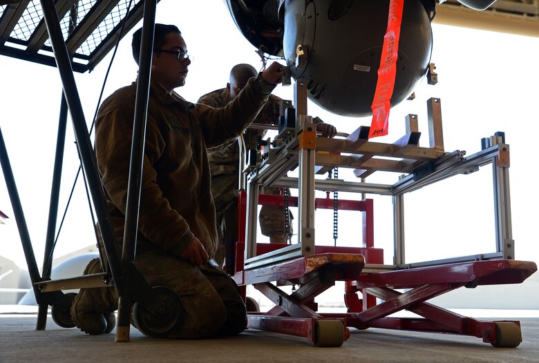 U.S. Air Force Airmen perform maintenance on an MQ-9 Reaper Nov. 27, 2017 at Kandahar Airfield, Afghanistan.