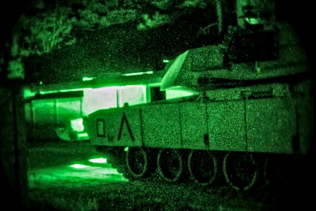 U.S. Marines Corps  M1A1 Abrams tank with Tank Platoon, Fox Company, Battalion Landing Team, 2nd Battalion, 6th Marine Regiment, 26th Marine Expeditionary Unit (MEU), provides security during a mechanized raid at Camp Lejeune, N.C., Dec. 7, 2017, to complete Combined Composite Training Unit Exercise (COMPTUEX). Combined COMPTUEX allows all elements of the Marine Air Ground Task Force to join and train in realistic scenarios so the MEU as a whole can meet its Predeployment Training Program objectives prior to an upcoming deployment at sea. (U.S. Marine Corps photo by Staff Sgt. Dengrier M. Baez)
