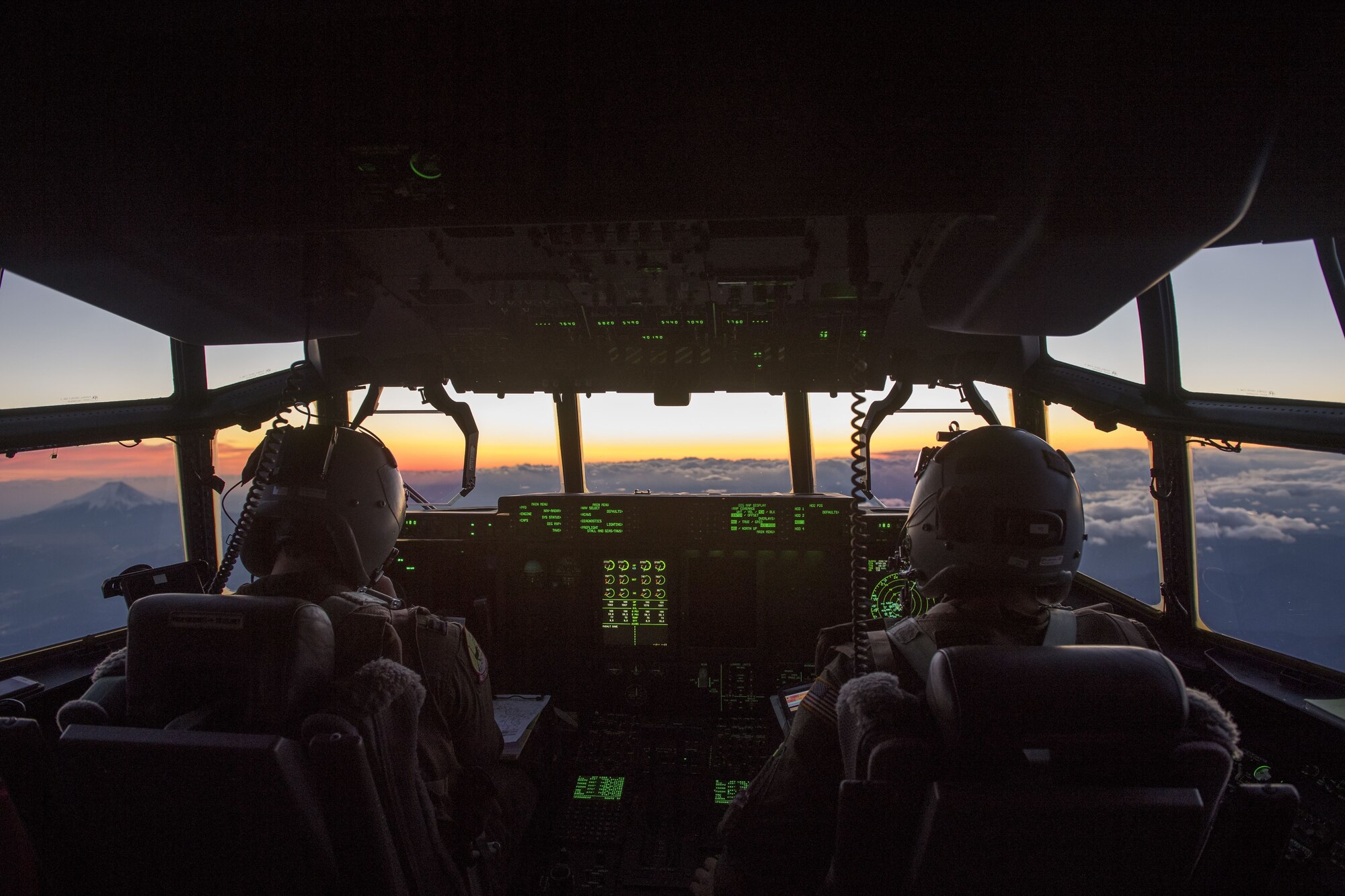 A 41st Troop Carrier Squadron C-130J Super Hercules aircrew from Little Rock Air Force Base, AR, flies past Mt. Fuji during exercise Vigilant Ace 18, Dec. 6, 2017, over the Saitama prefecture, Japan.