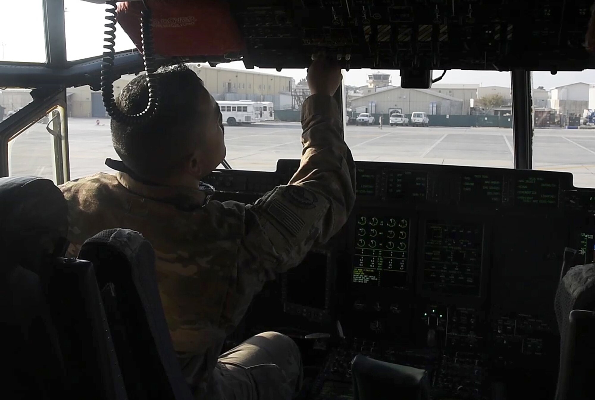 Staff Sgt. Anthony Single, 455th Expeditionary Aircraft Maintenance Squadron crew chief, resets flight controls for the pilots Dec. 5, 2017 at Bagram Airfield, Afghanistan.