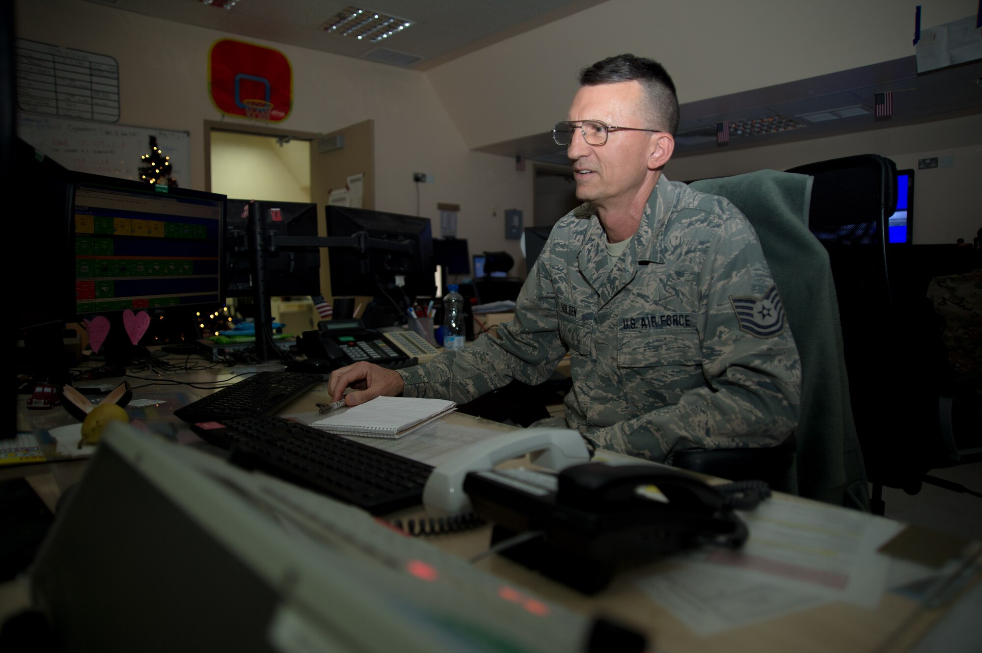 Tech. Sgt. Holden 386th Expeditionary Maintenance Squadron maintenance operation center controller, confirms information in a maintenance database at an undisclosed location in Southwest Asia, Dec. 6, 2017. The MOC is responsible for accurately recording the mission capabilities of all aircraft under the 386th AEW purview.