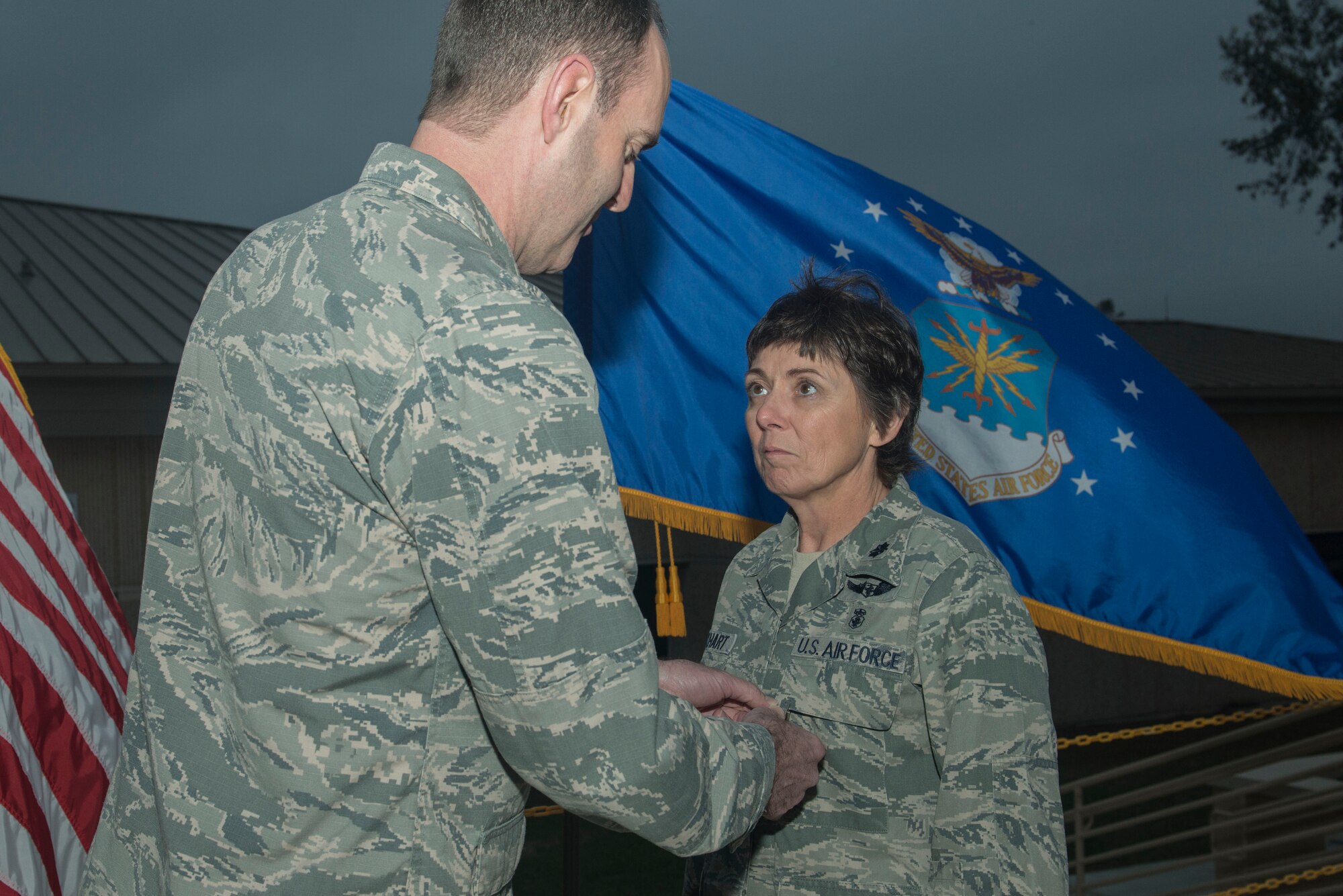 U.S. Air Force Col. Brian Wyrick, 20th Medical Group (MDG) commander, pins a Bronze Star Medal onto Lt. Col. Cheryl Lockhart, 20th MDG chief nurse, at Shaw Air Force Base, South Carolina, Nov. 8, 2017.