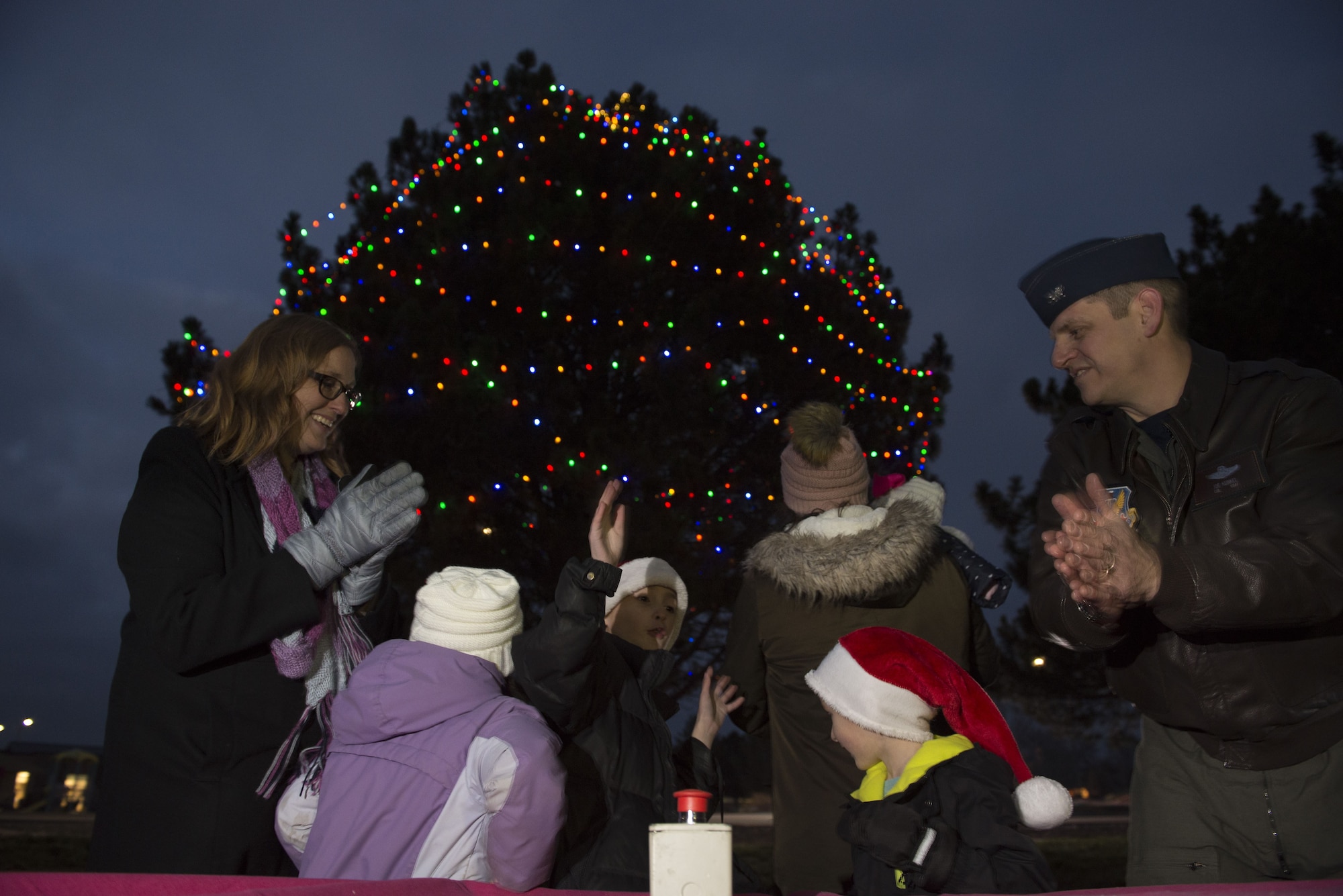 Air Force families celebrate the holiday time with parade and tree
