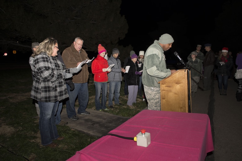 Staff Sgt. Anthony Bean, 366th Fighter Wing, NCO in charge of chapel readiness and support, leads the Christmas carolers in singing Jingle Bells Dec. 8, 2017, at Mountain Home Air Force Base, Idaho. The Christmas Carolers sang Jingle Bells, Silent Night and Deck the Halls. (U.S. Air Force photo by Senior Airman Lauren-Taylor Levin)