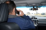According to Department of Defense Instruction 6055.0, DOD personnel are prohibited from driving any vehicle on or off installations on official government while text messaging, using cell phones, or using other hand-held electronic devices unless the vehicle is safely parked or they are using a hands free device, except for receiving or placing calls in performance of duties from tactical or emergency vehicles or other mission critical duties, to include law enforcement use of in car mobile data terminals and other in car electronic devices. Use of hands-free devices is also discouraged as creating significant distractions from safe driving performance.