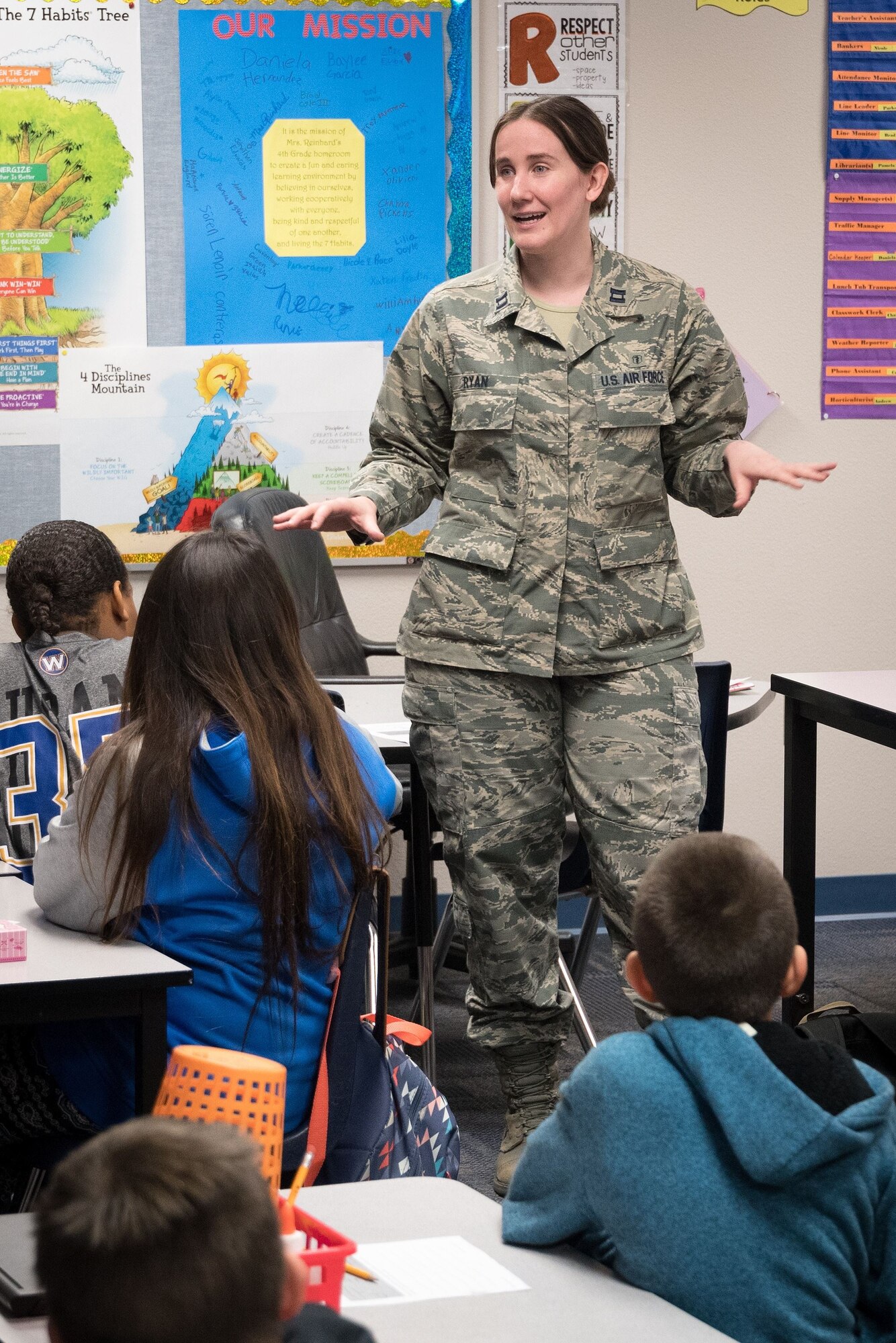 Capt. Brooke Ryan, 56th Medical Operations Squadron member, speaks with a class of students Nov. 21, 2017, at Luke Elementary School, Glendale, Ariz. Students created projects that represented National Disability Employment Awareness Month, and students with the best submissions from each grade level received awards.
