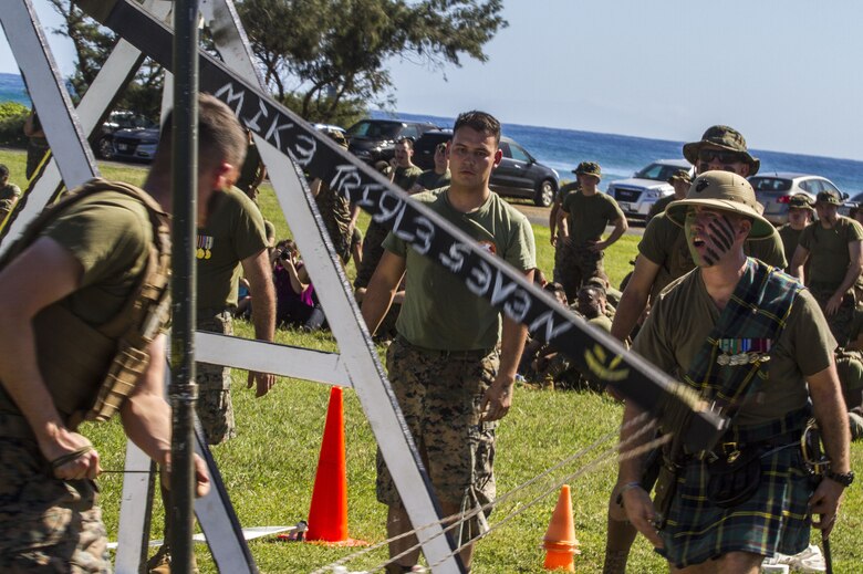 U.S. Marines with 1st Battalion, 12th Marine Regiment (1/12) prepare to fire their trebuchet during their annual celebration of St. Barbara’s day, Dec. 7, 2017. The unit honored St. Barbara, the patron saint of artillery, by pitting teams from each battery against each other and challenging them to build and operate their own trebuchet, a medieval siege weapon. The event served to promote healthy competition and cohesion between Marines of 1/12, while also teaching the history of their occupation.   (U.S. Marine Corps photo by Lance Cpl. Luke Kuennen)