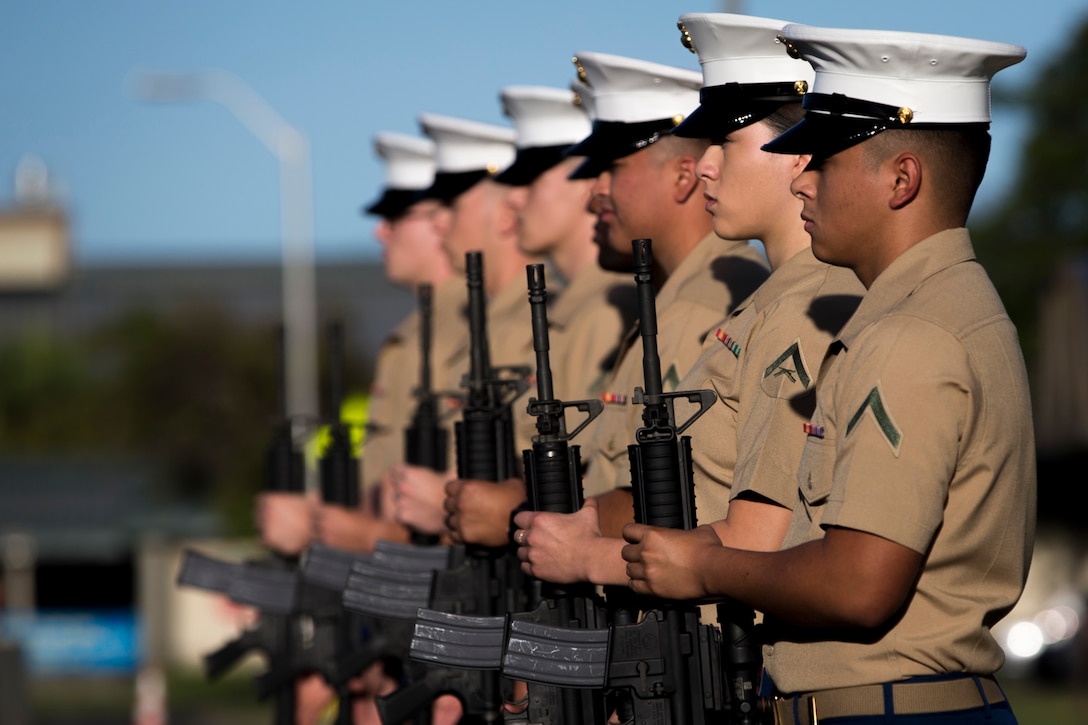U.S. Marines with the rifle detail for the annual Kaneohe Klipper Memorial Ceremony present arms aboard Marine Corps Base Hawaii, Dec. 7, 2017. The Kaneohe Klipper Memorial Monument was dedicated in 1981, in honor those who gave the ultimate sacrifice aboard U.S. Naval Air Station, Kaneohe Bay, Dec. 7, 1941, and a remembrance ceremony is conducted every year. (U.S. Marine Corps Photo by Sgt. Alex Kouns)