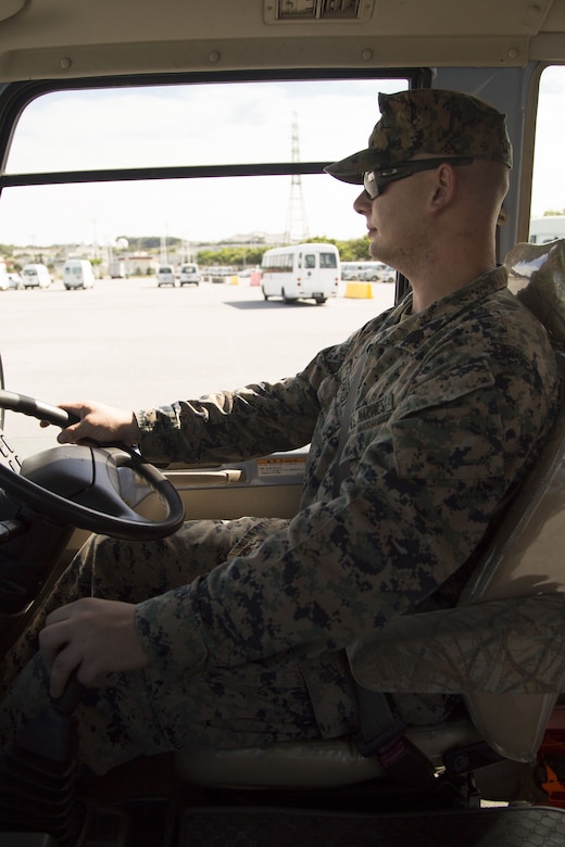 CAMP FOSTER, OKINAWA, Japan – Sgt. Kristofer Schmidt maneuvers through a docking bay course Nov. 28 in the Garrison Mobile Equipment parking lot aboard Camp Foster, Okinawa, Japan.