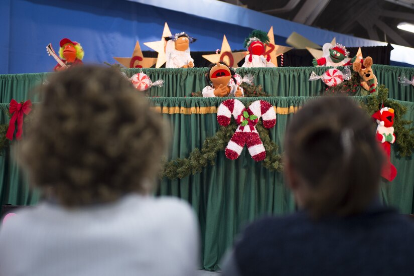 Berryville Baptist Rascals perform a puppet show at the Parents and Children Fighting Cancer holiday party on Joint Base Andrews, Md., Dec. 9, 2017. The event also featured dance performances by Agency 9 Performance Dance Company, face painting and various displays from units assigned to JBA.