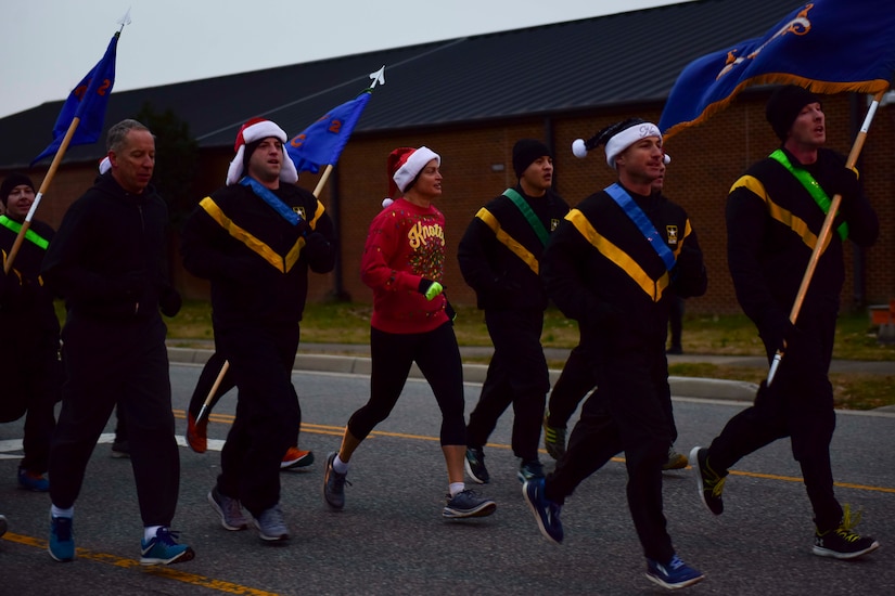 U.S. Army Soldiers run during the annual U.S. Marine Corps’ Toys for Tots run to celebrate the success of the program at Joint Base Langley-Eustis, Va., Dec. 7, 2017.