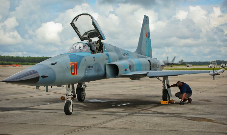 A pilot does pre-flight checks on a F-5N Tiger II aboard Marine Corps Air Station Beaufort, Aug. 21.