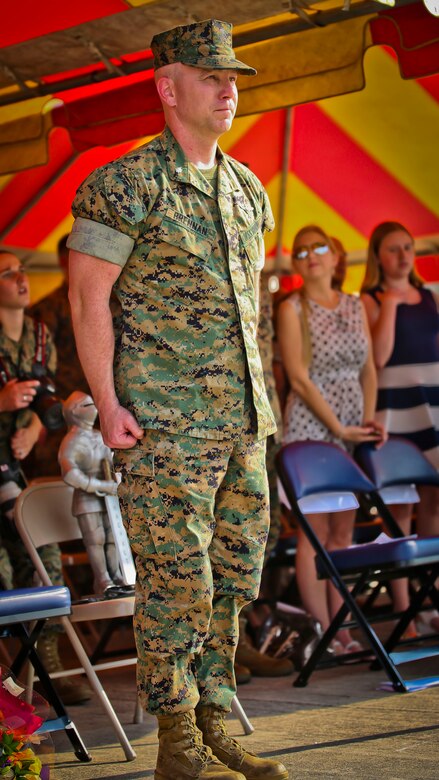 Lt. Col. Michael P. Brennan Latt stands at attention during the playing of the Marine Corps Hymn during a Relinquishment of Command Ceremony aboard Marine Corps Air Station Beaufort, Sept. 22. During the ceremony, Lt. Col. Michael P. Brennan relinquished command of “The Flying Leathernecks” and then cased the squadron colors for transport. The squadron will stand up aboard Marine Corps Air Station Yuma, Ariz. as an F-35B Lightning II Joint Strike Fighter squadron.