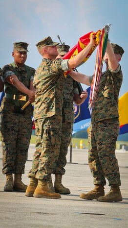 Lt. Col.  Michael P. Brennan and Master Gunnery Sgt. Charles Wright case the Marine Fighter Attack Squadron 122 Colors during a Relinquishment of Command Ceremony aboard Marine Corps Air Station Beaufort, Sept. 22. During the ceremony, Lt. Col. Michael P. Brennan relinquished command of “The Flying Leathernecks” and then cased the squadron colors for transport. The squadron will stand up aboard Marine Corps Air Station Yuma, Ariz. as an F-35B Lightning II Joint Strike Fighter squadron.