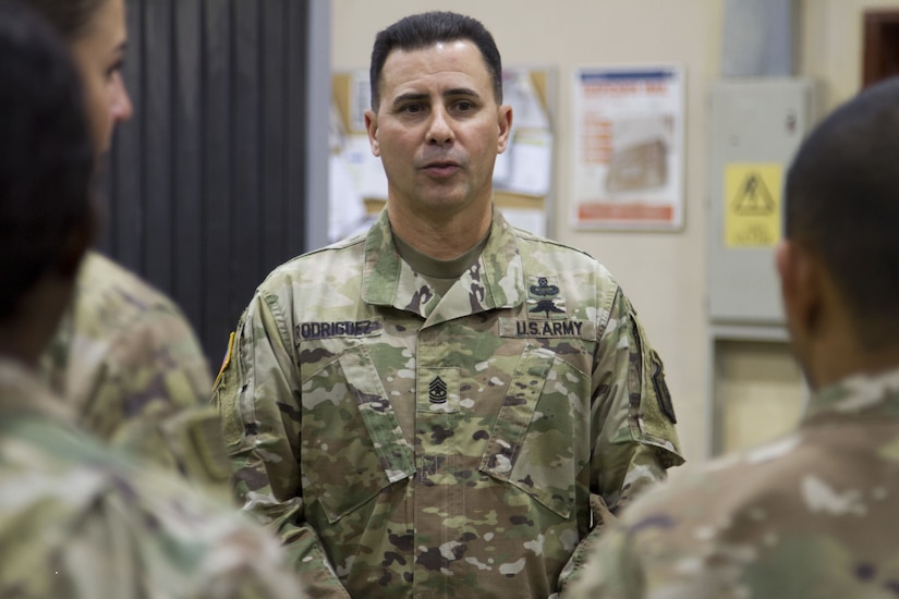 Soldier speaking to a group.