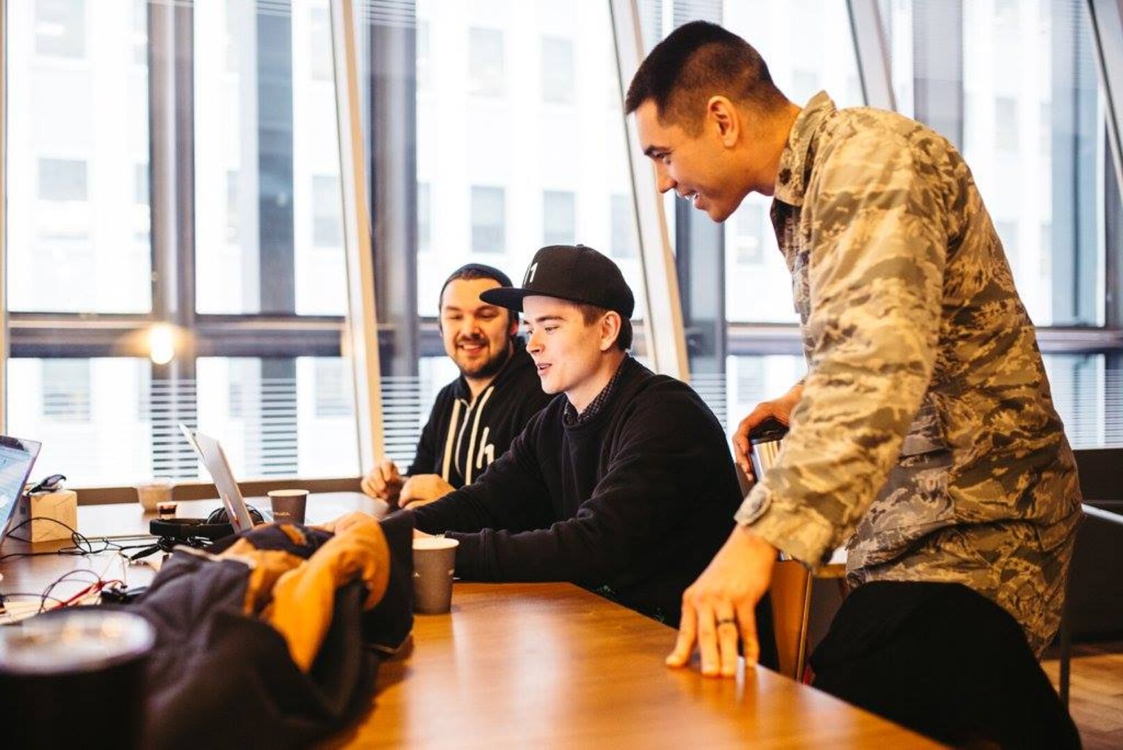 Maj. Barret Darnell, 315th Cyber Operations Squadron, checks out techniques used by the Hack the Air Force 2.0 participants Dec. 9, 2017.