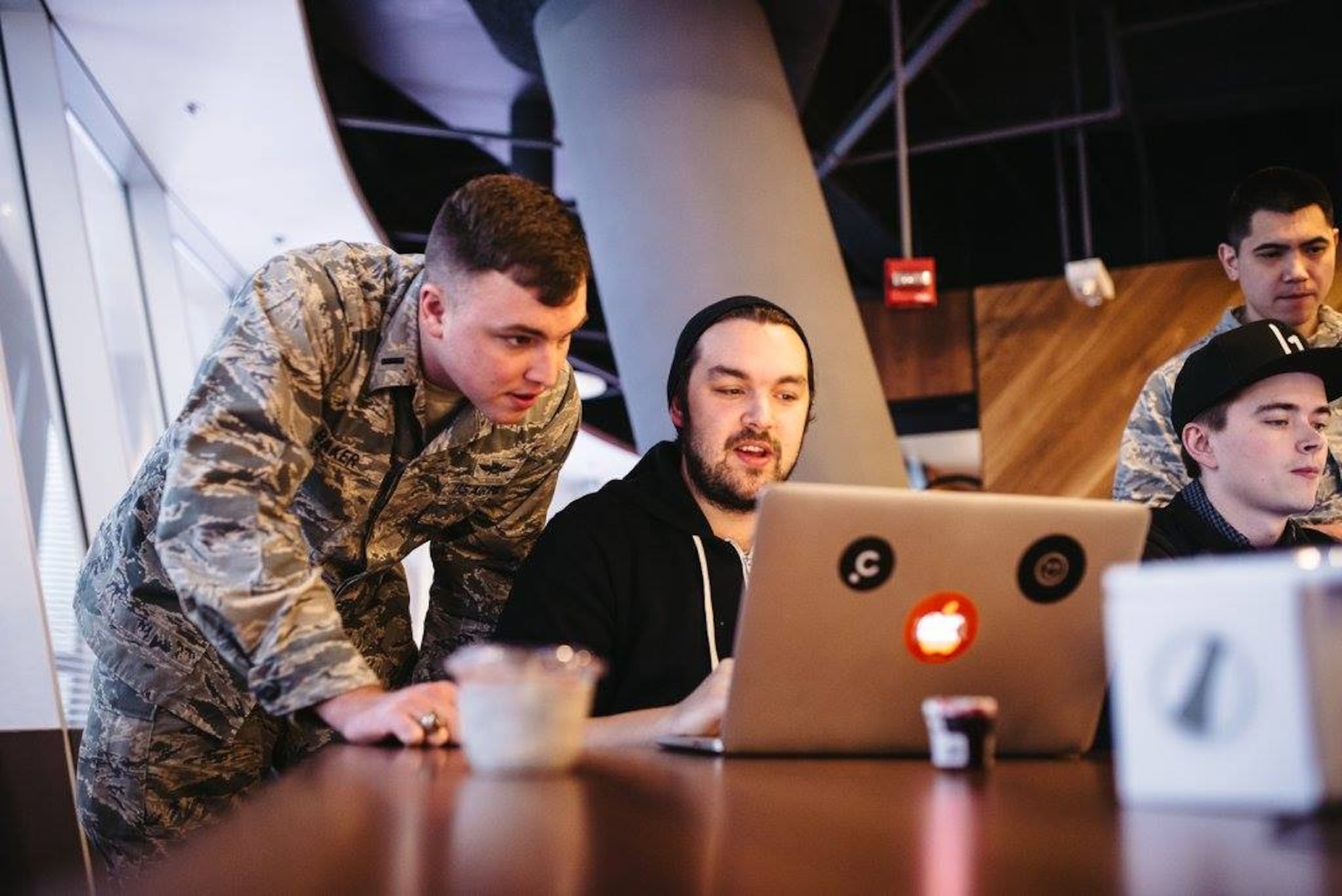 1st Lt. Stephen Baker, 352nd Cyber Operations Squadron, watches as one of the Hack the Air Force 2.0 participants attempts to breach the security on a .mil website Dec. 9, 2017.
