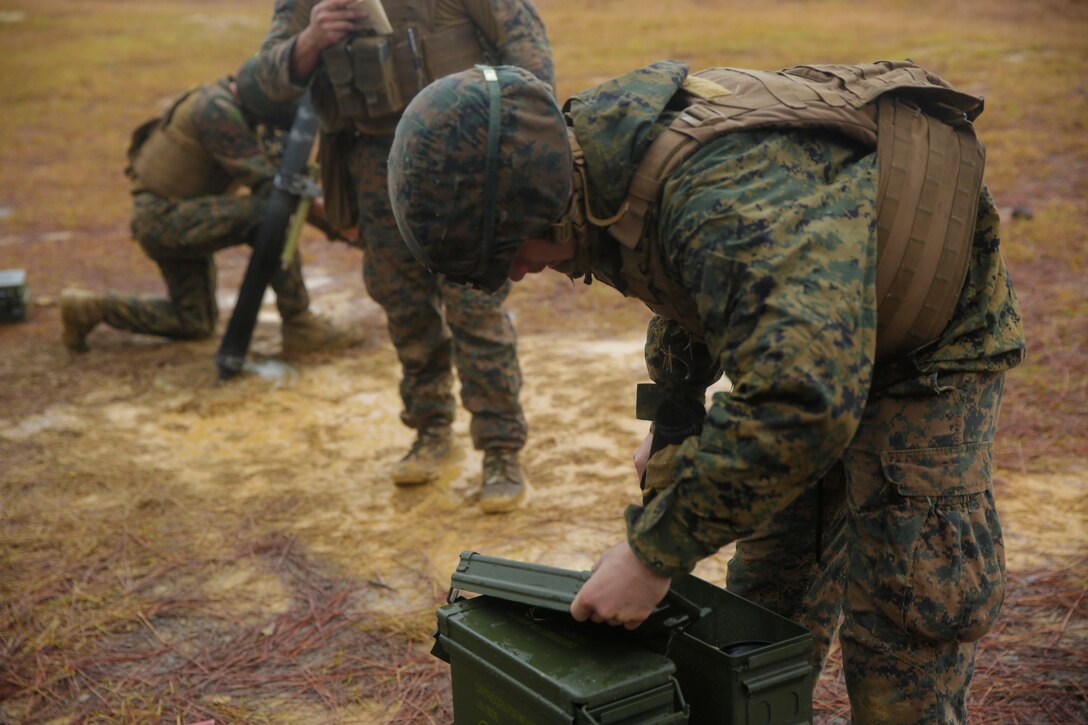 Lance Cpl. Robert Marino prepares 81mm high-explosive mortar rounds during a call-for-fire training exercise at Camp Lejeune, N.C., Dec. 7, 2017. Marines conduct call-for-fire training, a method of fire support used to suppress an enemy or set up a defensive screen, multiple times throughout the year to maintain expeditionary readiness. Marino is a mortarman with Alpha Company, 2nd LAR. (U.S. Marine Corps photo by Lance Cpl. Leynard Kyle Plazo)