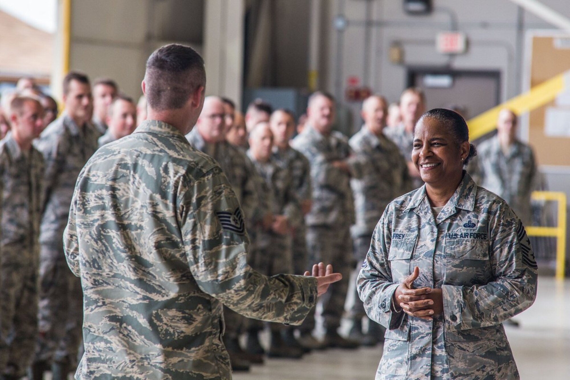 Air Mobility Command Command Chief Master Sgt. Shelina Frey visits with Missouri Air National Guard Airmen at Rosecrans.