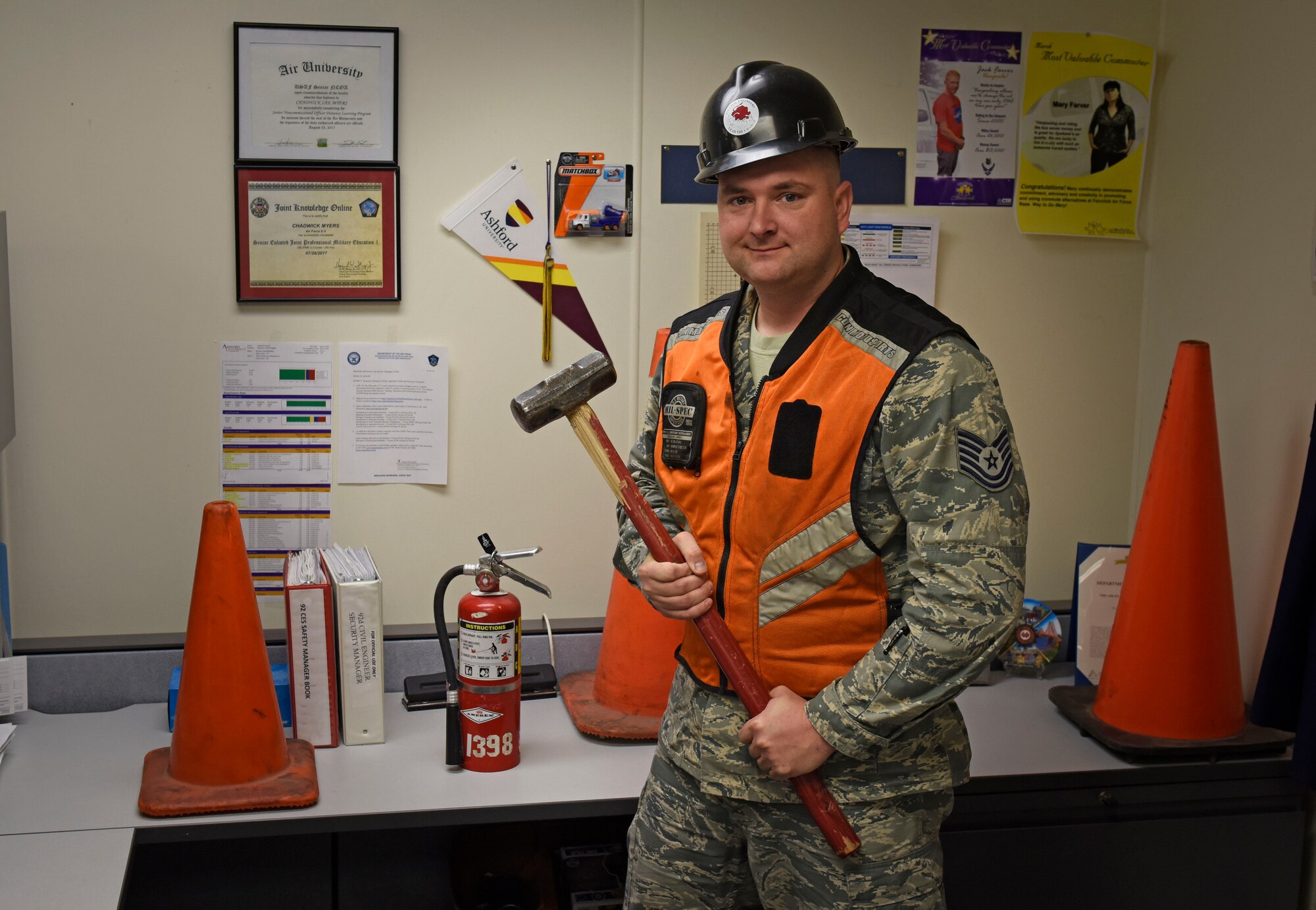 Tech Sgt. Chadwick Myers, 92nd Civil Engineer Squadron NCO in charge of Command Support Squadron, poses for photo at Fairchild Air Force Base, Dec. 12, 2017. Myers volunteered to take the roles of the safety NCO in charge, the building custodian and the unit safety manager. (U.S. Air Force photo/Airman 1st Class Jesenia Landaverde)
