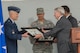 Montgomery Mayor Todd Strange presents the Keys to the City to Lt. Gen. Steven Kwast, Air University commander, and Col. Eric Shafa, 42nd Air Base Wing commander, April 17, 2017. The mayor presented the keys as a show of appreciation for the Maxwell Air Force Base “Heritage to Horizon” Air Show, April 8-9, 2017. The International Council of Air Shows awarded Maxwell the Dick Schram Memorial Community Relations Award for having the best air show in 2017. (U.S. Air Force photo by Trey Ward)