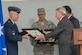 Montgomery Mayor Todd Strange presents the Keys to the City to Lt. Gen. Steven Kwast, Air University commander, and Col. Eric Shafa, 42nd Air Base Wing commander, April 17, 2017. The mayor presented the keys as a show of appreciation for the Maxwell Air Force Base “Heritage to Horizon” Air Show, April 8-9, 2017. The International Council of Air Shows awarded Maxwell the Dick Schram Memorial Community Relations Award for having the best air show in 2017. (U.S. Air Force photo by Trey Ward)