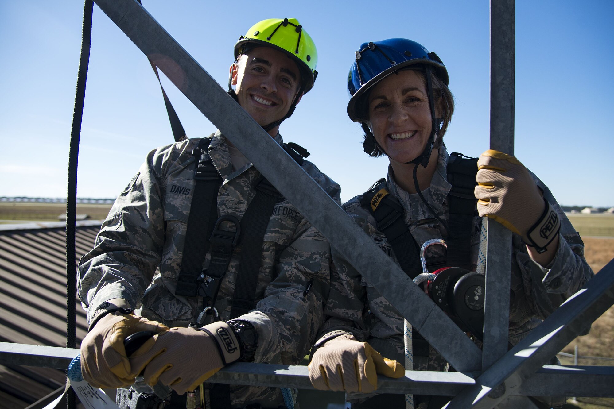 Senior Airman Grant Davis, left, 23d Operations Support Squadron (OSS) radar, airfield and weather systems (RAWS) technician, and Col. Jennifer Short, 23d Wing commander, pose for a photo during an immersion tour, Dec. 11, 2017, at Moody Air Force Base, Ga. Moody leadership visited the RAWS facility to familiarize themselves with the 23d OSS’s duties and to gain a better understanding of how they impact the mission. (U.S. Air Force photo by Airman 1st Class Erick Requadt)