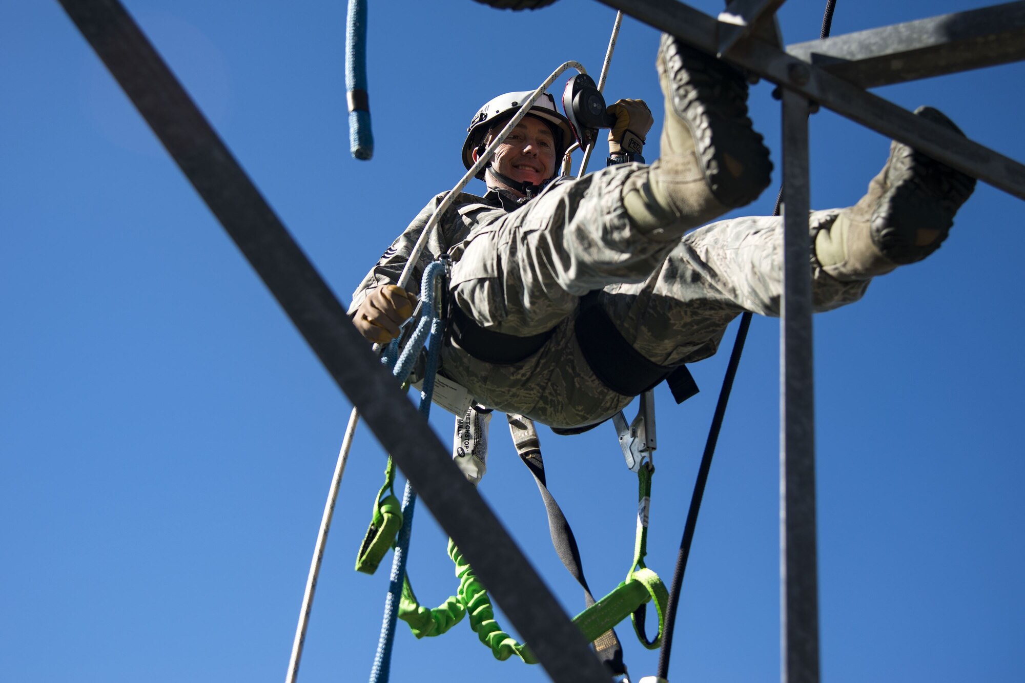 Chief Master Sgt. Jarrod Sebastian, 23d Wing command chief, repels down a radio antenna tower, Dec. 11, 2017, at Moody Air Force Base, Ga. Moody leadership visited the radar, airfield and weather systems facility to familiarize themselves with the 23d Operations Support Squadron’s duties and to gain a better understanding of how they impact the mission. (U.S. Air Force photo by Airman 1st Class Erick Requadt)