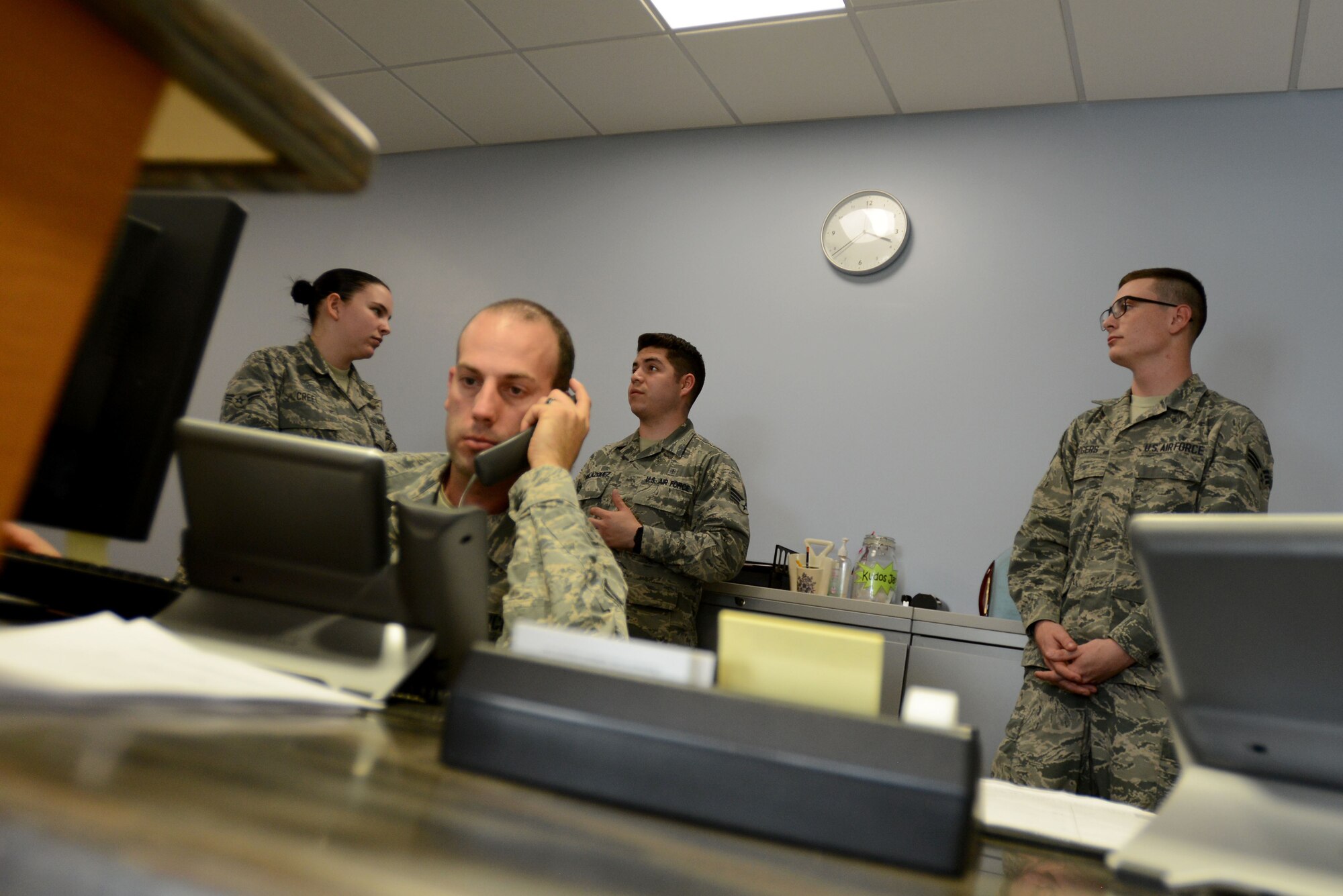 Airmen from the 20th Medical Group Mental Health Flight prepare for walk-in patients at Shaw Air Force Base, S.C., Dec. 4, 2017.