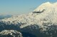 A C-17 Globemaster III flies past Mount Rainier in west-central Washington, Dec. 6, 2017. The aircraft was one of eight flying an airdrop mission to a simulated forward operating base as part of Rainier War, an exercise designed to ensure the full-spectrum readiness of Team McChord. (U.S. Air Force photo by Airman 1st Class Sara Hoerichs)