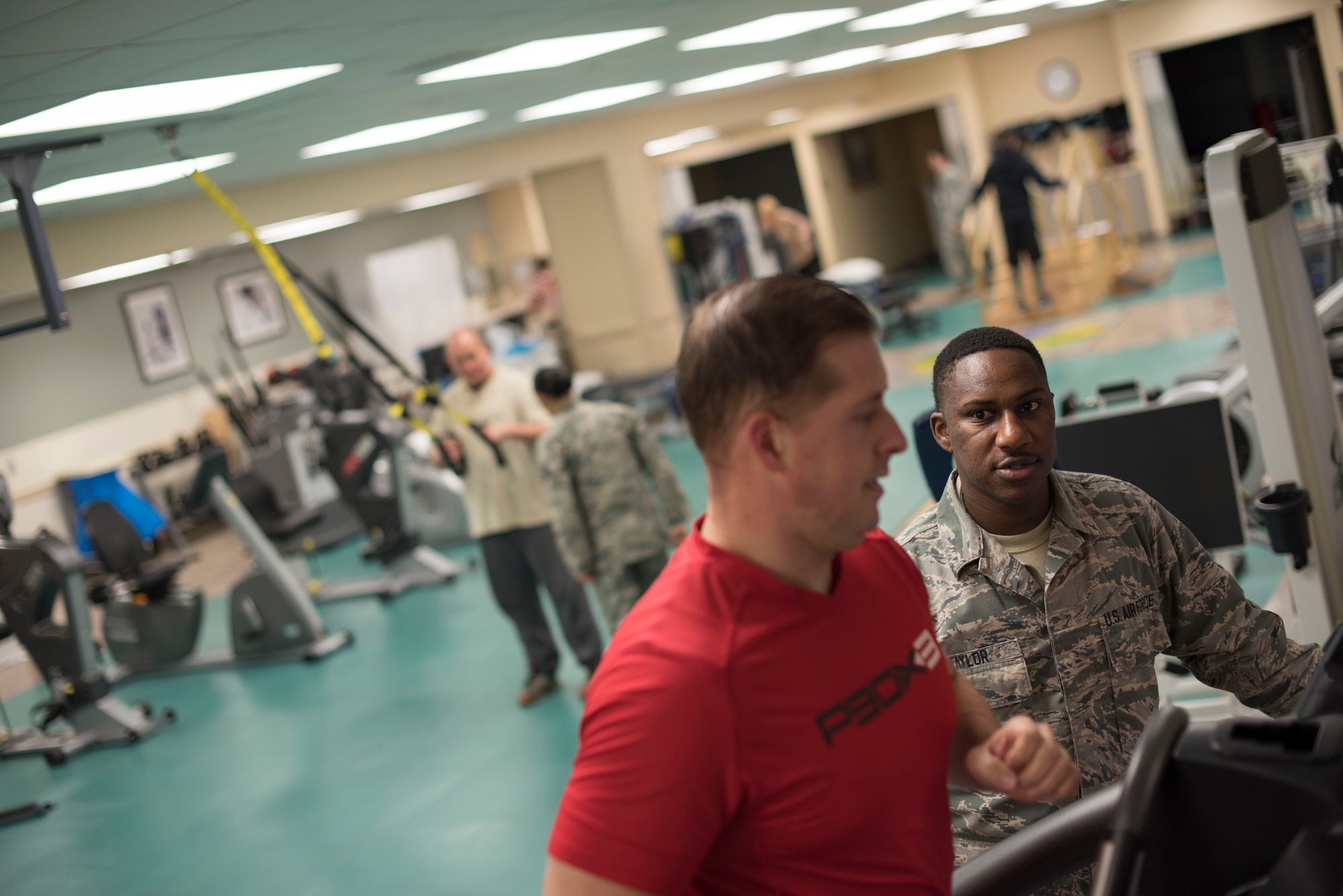 Staff Sgt. Christian J. Taylor, 60th Medical Operations physical medicine technician, directs his patient Tech. Sgt. James Hodgman, 60th Air Mobility Wing Public Affairs NCO in charge of command information, at the physical therapy clinic inside David Grant USAF Medical Center at Travis Air Force Base, Calif., Nov. 27, 2017. The physical therapy clinic is comprised of dedicated professionals who specialize in providing care for musculoskeletal disorders and movement dysfunction. (U.S. Air Force photo by Airman 1st Class Jonathon D. A. Carnell)