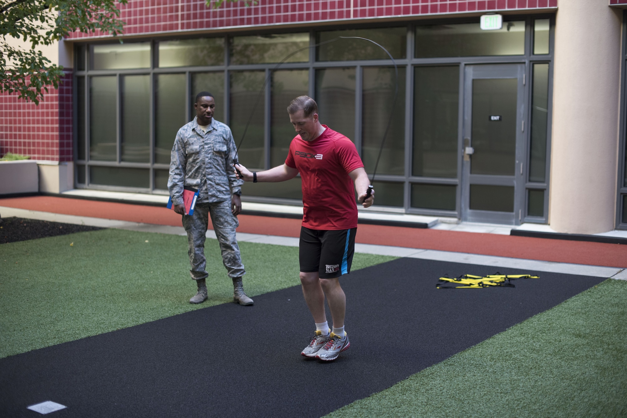 Staff Sgt. Christian J. Taylor, 60th Medical Operations physical medicine technician, directs his patient Tech. Sgt. James Hodgman, 60th Air Mobility Wing Public Affairs NCO in charge of command information, at the physical therapy clinic inside David Grant USAF Medical Center at Travis Air Force Base, Calif., Nov. 27, 2017. The physical therapy clinic is comprised of dedicated professionals who specialize in providing care for musculoskeletal disorders and movement dysfunction. (U.S. Air Force photo by Airman 1st Class Jonathon D. A. Carnell)