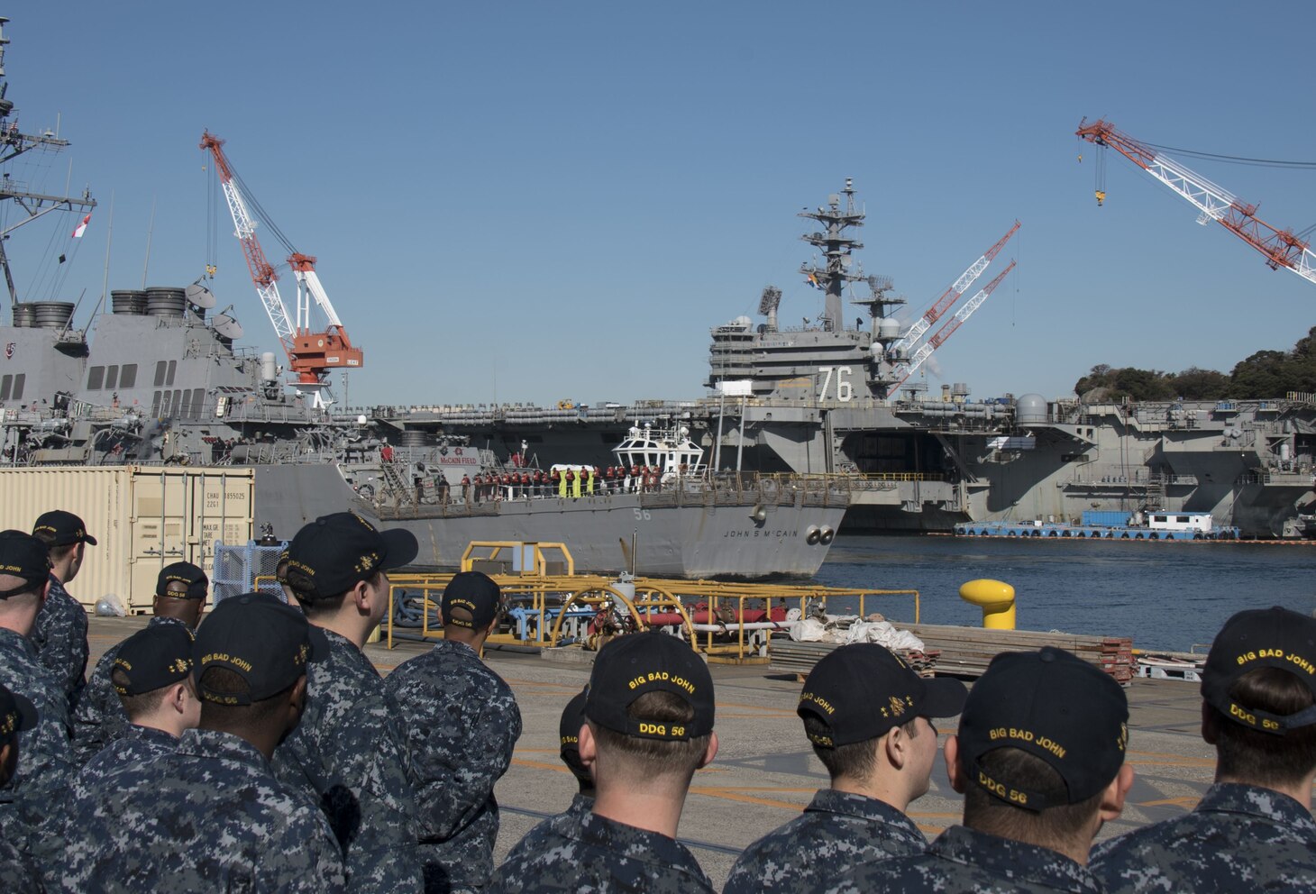 TOKYO BAY, Japan (Dec. 13, 2017) - The Arleigh Burke-class guided-missile destroyer USS John S. McCain (DDG 56) is towed to the pier at Fleet Activities (FLEACT) Yokosuka. John S. McCain will undergo repairs at Ship Repair Facility – Japan Regional Maintenance Center in Yokosuka.
