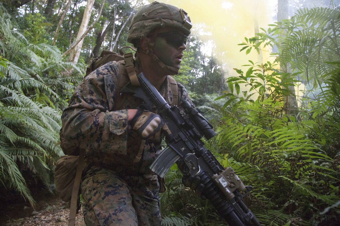 Marines conduct simulated village raids during the 3rd Marine Division Annual Squad Competition.
