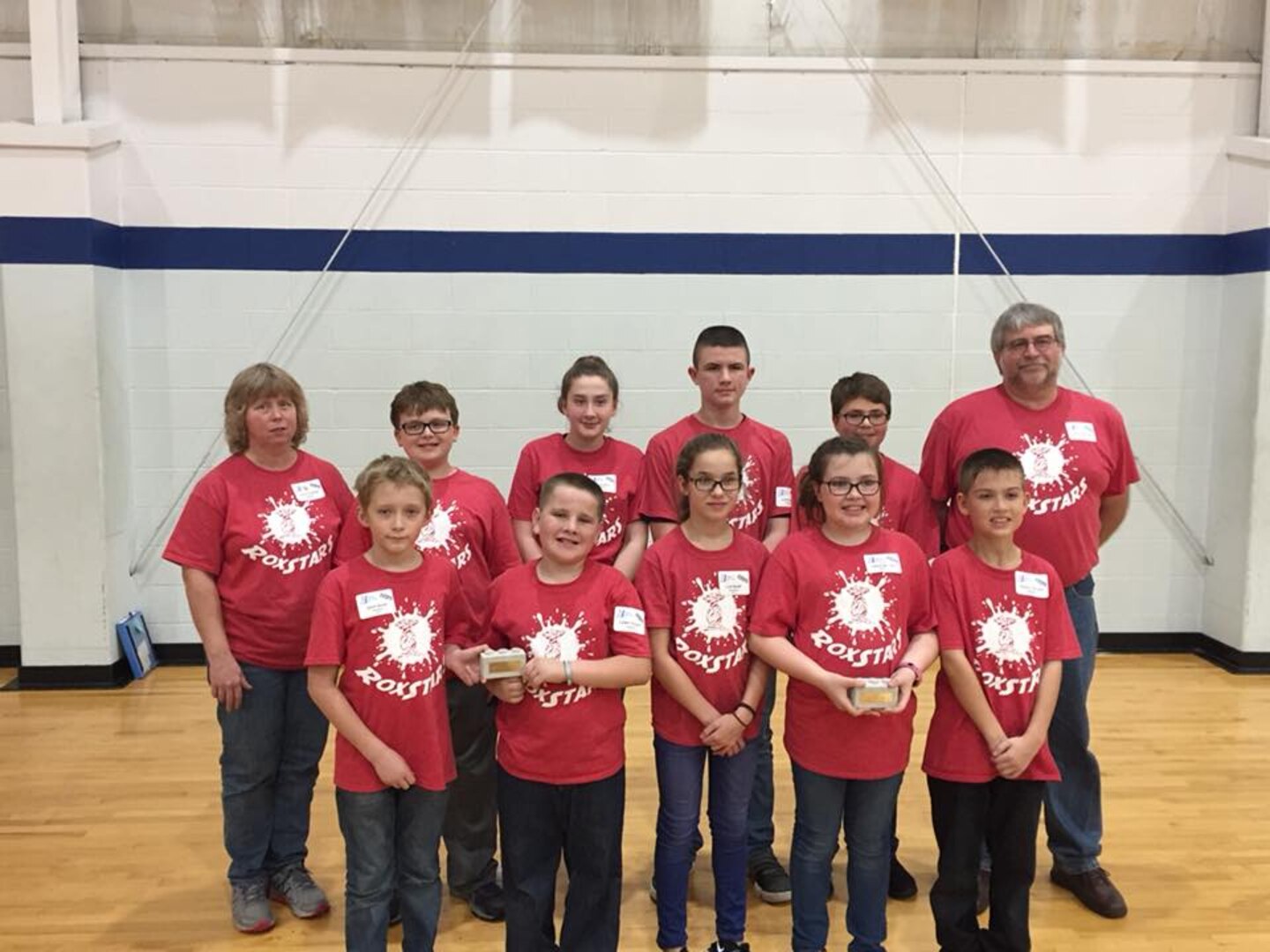 Lorna Troutman, left, NSWC Crane employee and six-year STEM volunteer, started small, launching the FLL at Shoals with one full team of 10 students. She knew she’d be learning right along with the students for the first year of the program, but that didn’t deter her from giving it a shot.