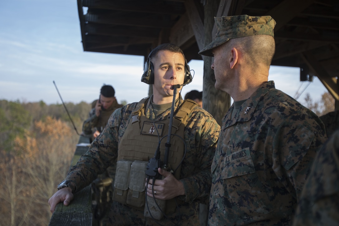 Maj. Gen. John Love speaks with Capt. Edward Fagan during his visit with Marines and sailors with 2nd Battalion, 8th Marine Regiment during the unit’s deployment for training exercise at Fort A.P. Hill, Va., Dec. 4, 2017. The visit allowed Love to observe the battalion’s readiness for an upcoming deployment to Japan. Love is the commanding general of 2nd Marine Division. (U.S. Marine Corps photo by Lance Cpl. Ashley McLaughlin)