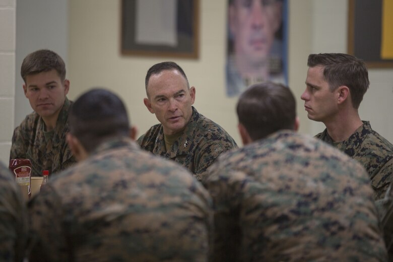 Maj. Gen. John Love speaks with Marines and sailors at breakfast during his visit with 2nd Battalion, 8th Marine Regiment during the unit’s deployment for training exercise at Fort A.P. Hill, Va., Dec. 5, 2017. The visit allowed Love to observe the battalion’s readiness for an upcoming deployment to Japan. Love is the commanding general of 2nd Marine Division. (U.S. Marine Corps photo by Lance Cpl. Ashley McLaughlin)