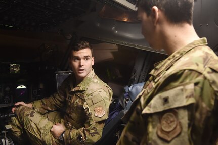 Capt. Matthew Anthony, 15th Airlift Squadron C-17 Globemaster pilot, performs preflight checks in preparation for a Joint Forcible Entry syllabus event in support of the U.S. Air Force Weapons School Integration phase here, Dec. 9. Thirty seven C-17s, 21 C-130 Hercules and 120 U.S. Army paratroopers participated in the mobility portion of the WSINT phase during a simulated mass JFE event over a contested target on a range near Nellis Air Force Base, Nev. The event is designed to teach Airmen how to get safely to their target and direct airpower and follow-on forces to that target.