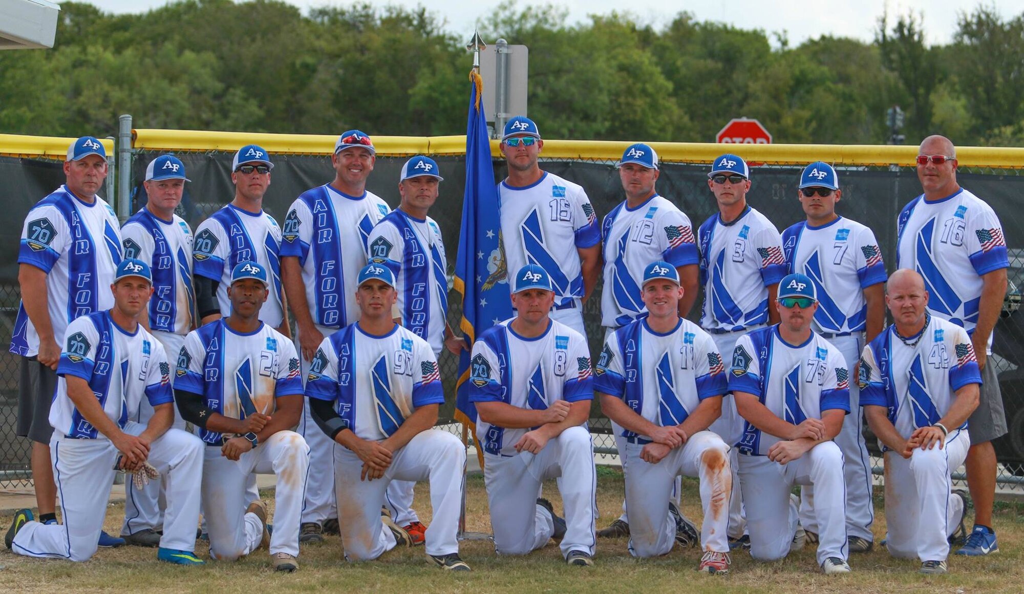 Senior Airman Michael Higgins, High Frequency Global Communication System radio operator with the 319th Communications Squadron, second from the back right, poses with the men’s All-Air Force softball team at Fort Sam Houston, Texas. (Courtesy photo)